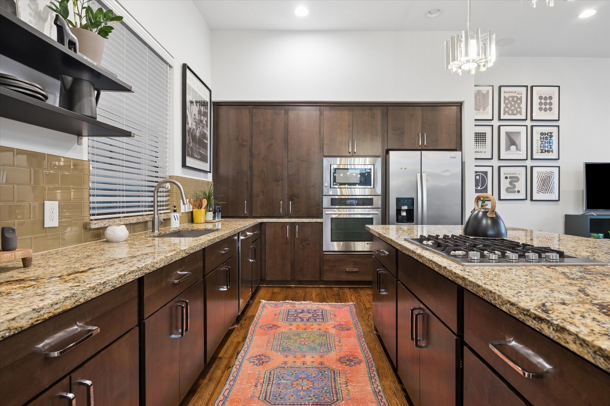 2110 Genesee Street Houston, TX 77006 - Photo 14 of 47 Well-appointed kitchen with stainless steel appliances, built-in oven, and ample storage.