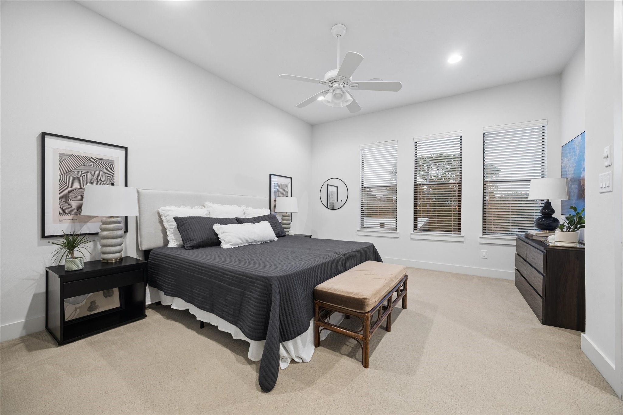 2110 Genesee Street Houston, TX 77006 - Photo 21 of 47 Spacious primary suite with high ceilings and multiple windows for exceptional natural light.