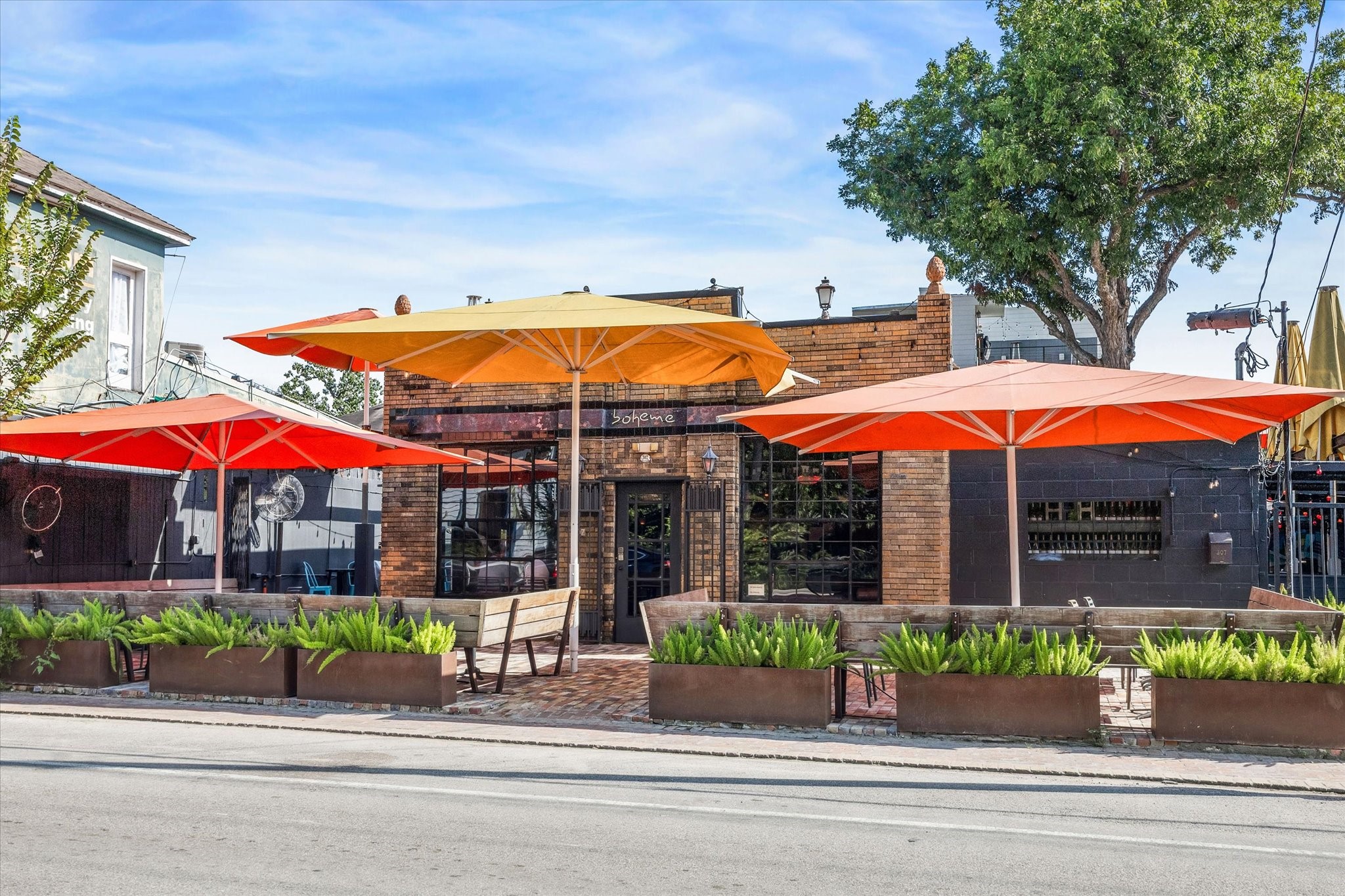 2110 Genesee Street Houston, TX 77006 - Photo 46 of 47 Start your evenings at Boheme, where the vibrant patio and craft cocktails set the tone for the night.