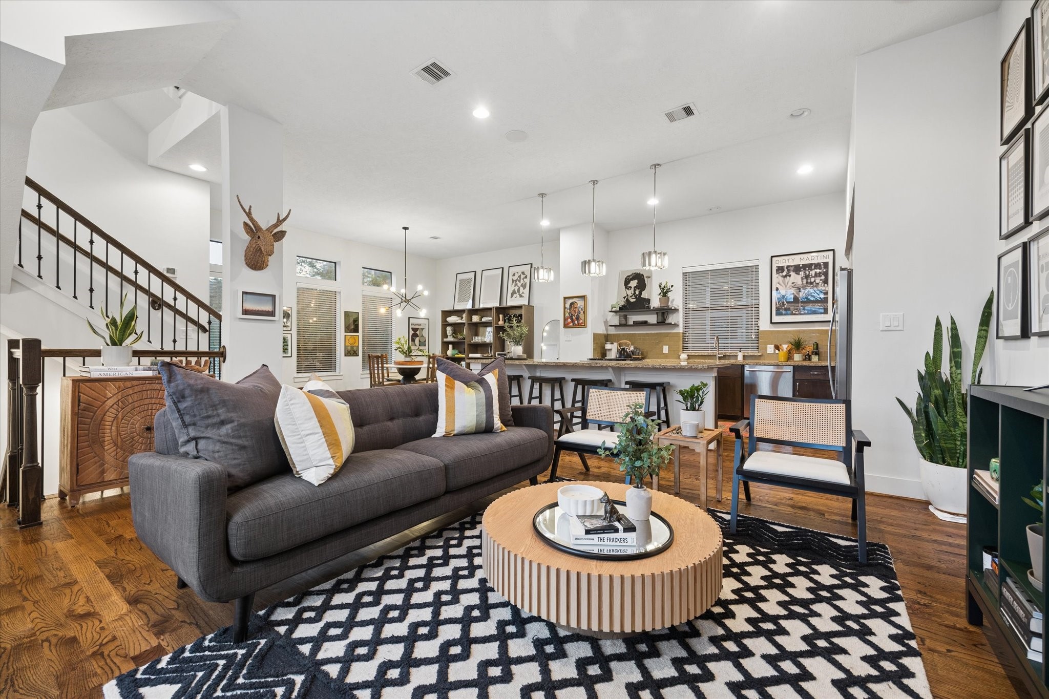 2110 Genesee Street Houston, TX 77006 - Photo 6 of 47 Open layout designed for effortless living, connecting the main living area to the kitchen.