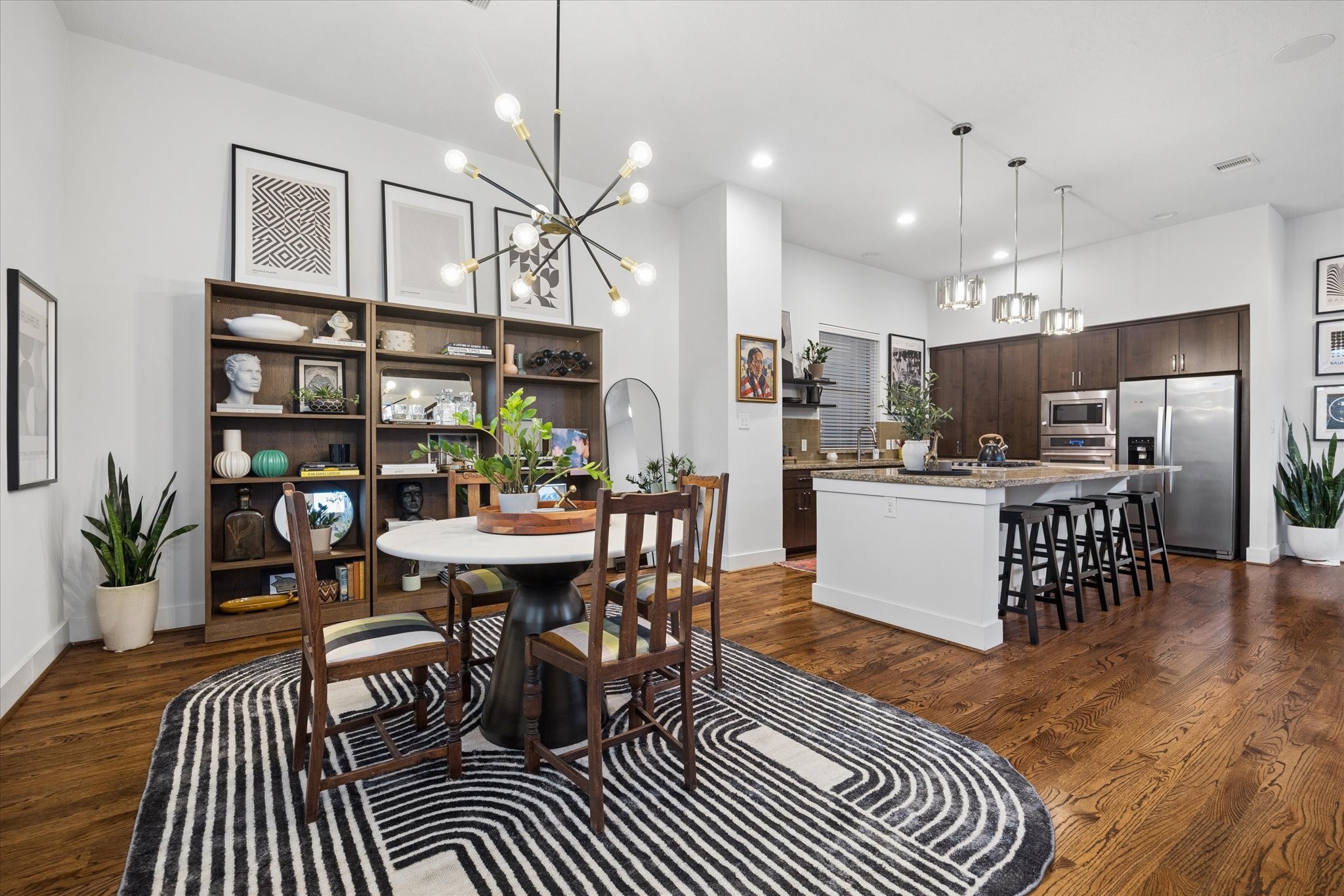 2110 Genesee Street Houston, TX 77006 - Photo 10 of 47 Well-proportioned dining space with elevated ceilings and strong natural light.
