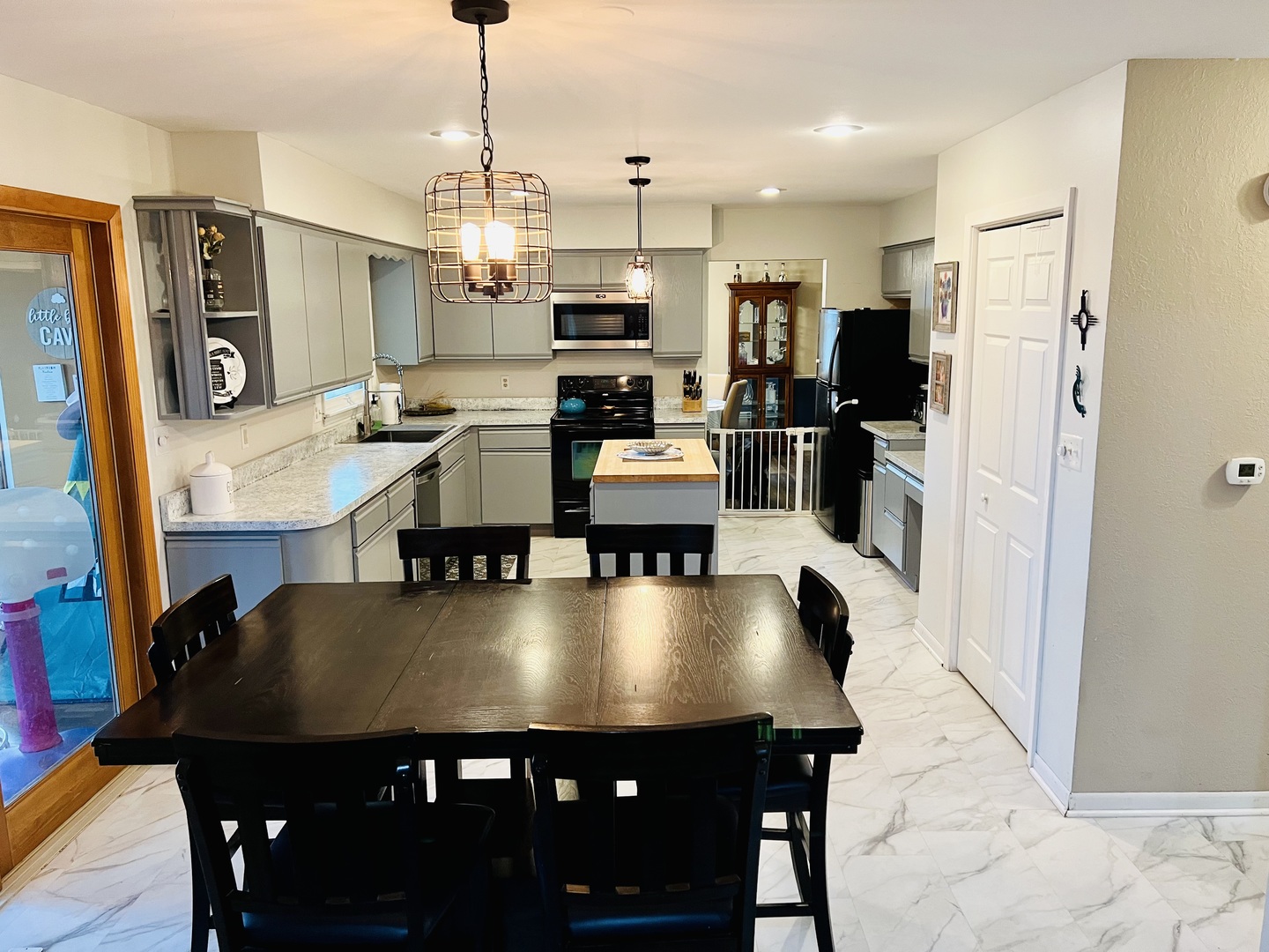 212 Drake Avenue Rochelle, IL 61068 - Photo 14 of 32 a view of kitchen and dining area with furniture