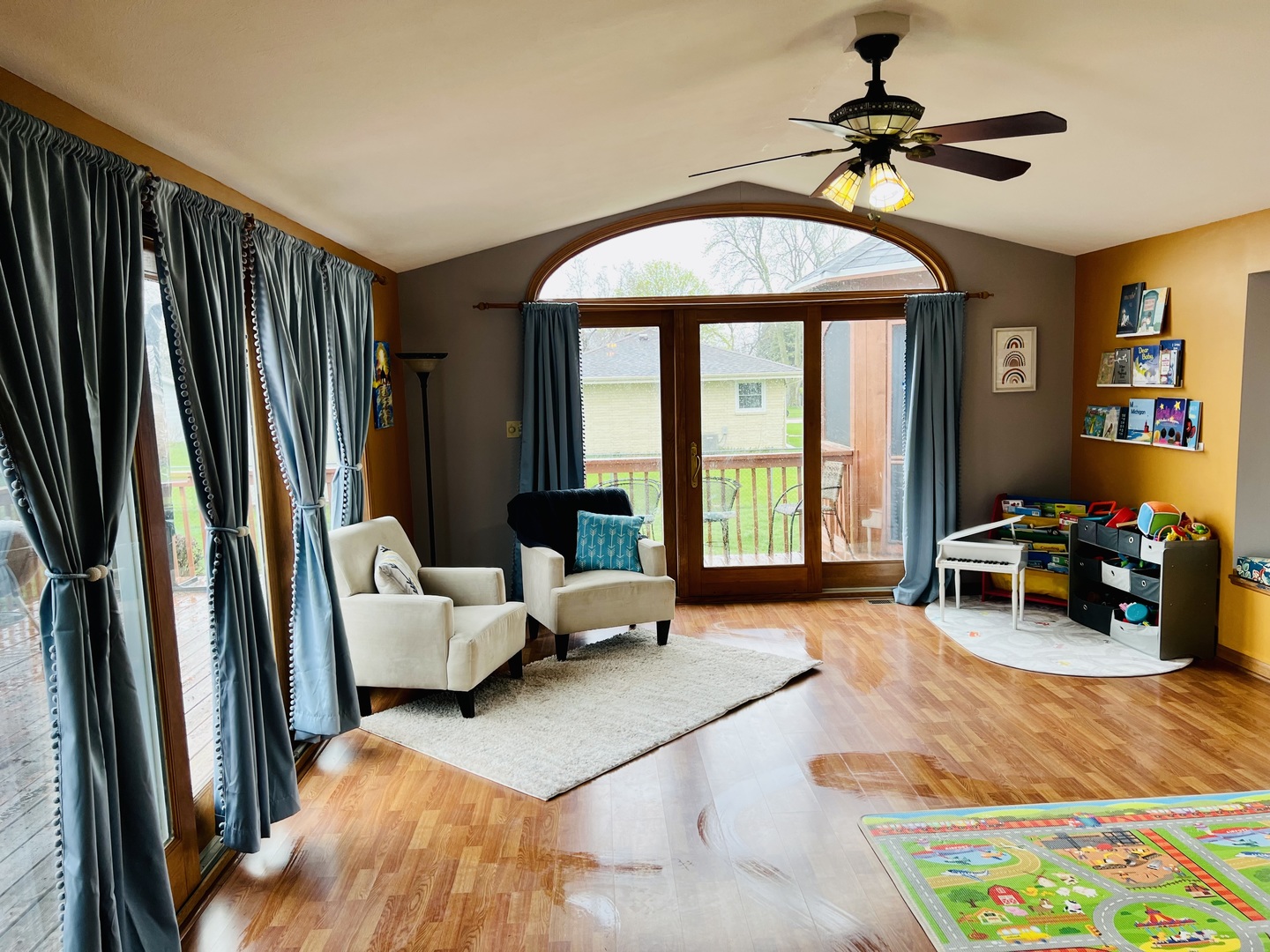 212 Drake Avenue Rochelle, IL 61068 - Photo 15 of 32 a living room with furniture and a chandelier