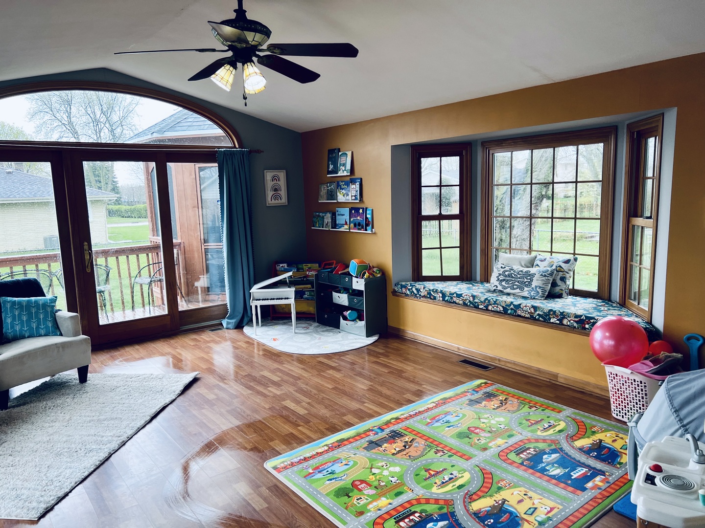 212 Drake Avenue Rochelle, IL 61068 - Photo 16 of 32 a living room with furniture and a floor to ceiling window