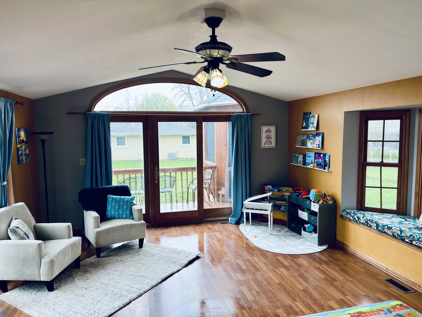 212 Drake Avenue Rochelle, IL 61068 - Photo 17 of 32 a living room with furniture and a chandelier