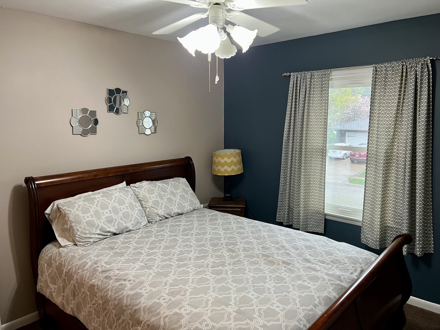 212 Drake Avenue Rochelle, IL 61068 - Photo 19 of 32 a bed sitting in a bedroom next to a window