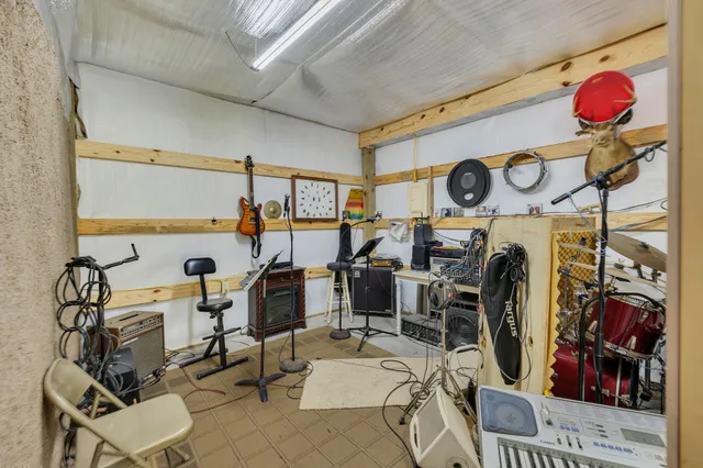 an aerial view of house with yard swimming pool and outdoor seating