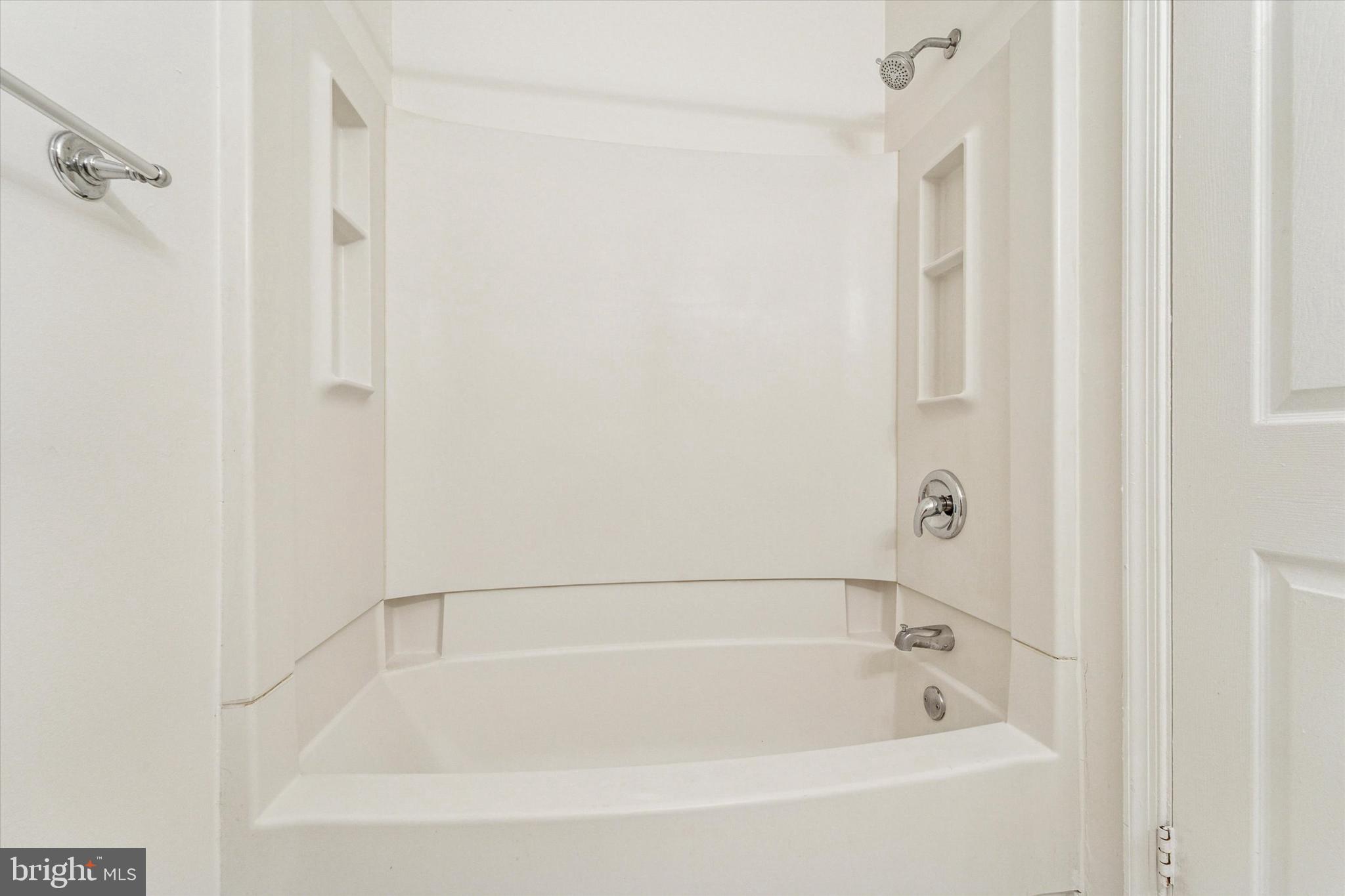 1606 Wallace Street, Unit 101 Philadelphia, PA 19130 - Photo 8 of 10 a bathroom with a bathtub