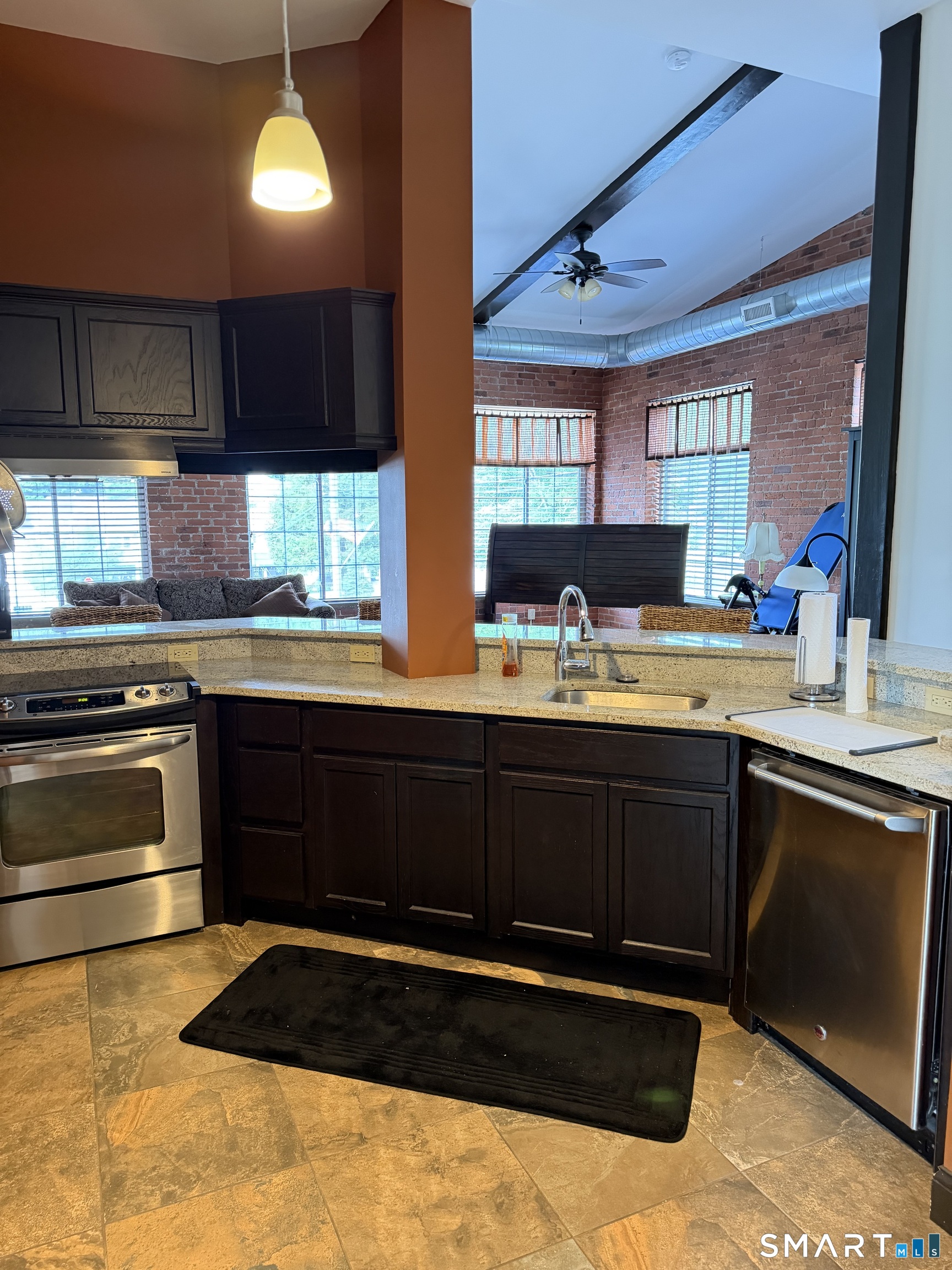 10 Summit Street, Unit 1 East Hampton, CT 06424 - Photo 5 of 14 a kitchen with a sink and a stove