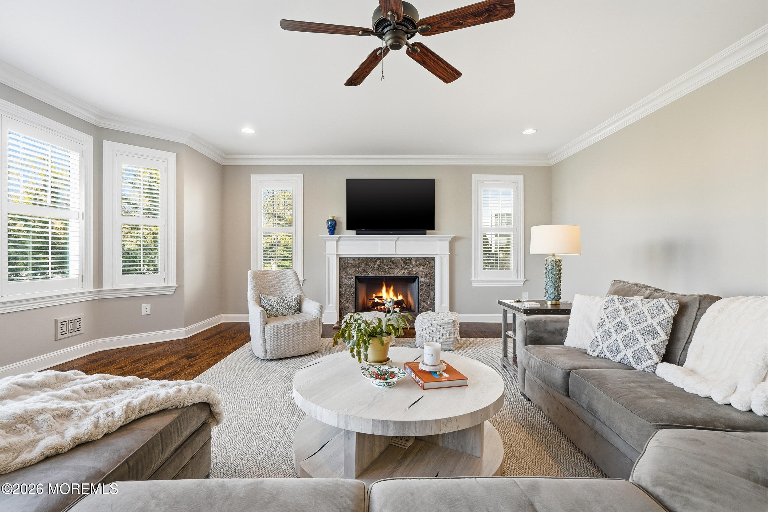619 Bowne Road Asbury Park, NJ 07712 - Photo 23 of 69 a living room with furniture and a fireplace