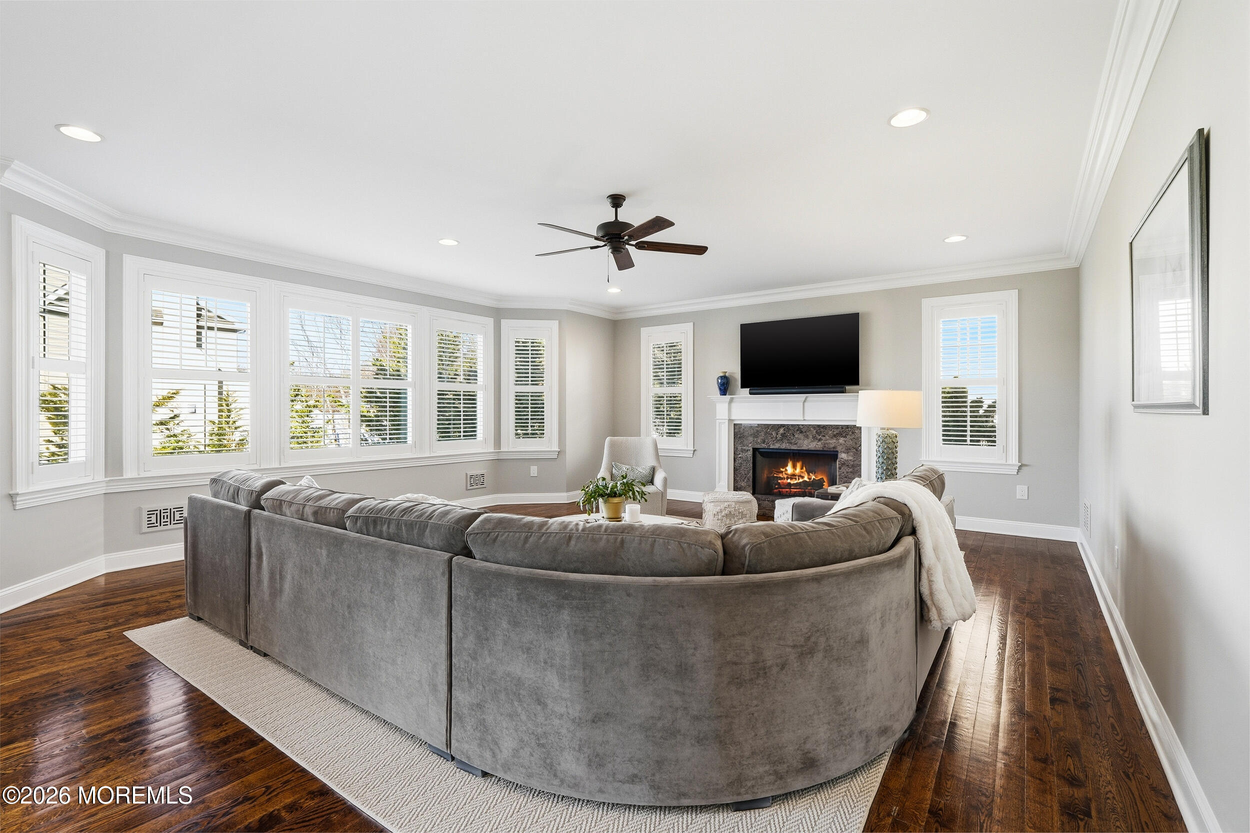 619 Bowne Road Asbury Park, NJ 07712 - Photo 24 of 69 a living room with fireplace furniture and a flat screen tv