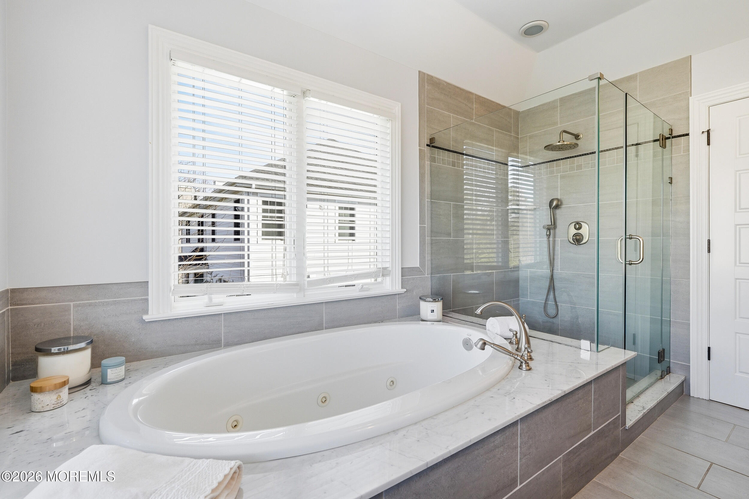 619 Bowne Road Asbury Park, NJ 07712 - Photo 38 of 69 a bathroom with a tub a sink and a window