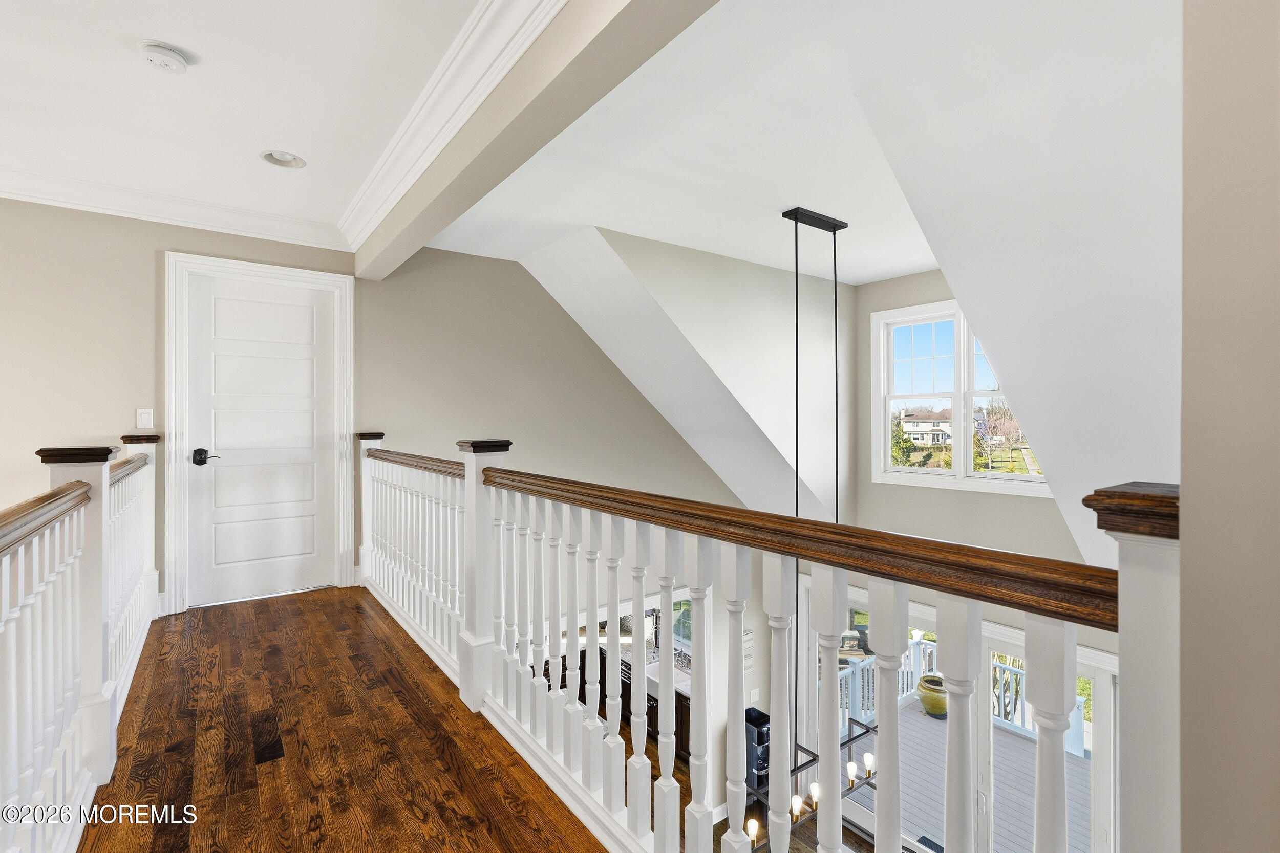 619 Bowne Road Asbury Park, NJ 07712 - Photo 47 of 69 a view of a hallway with wooden floor and staircase