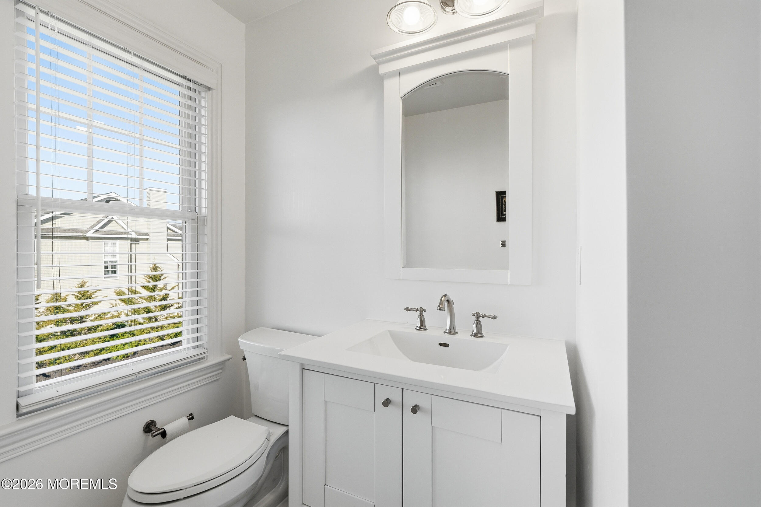619 Bowne Road Asbury Park, NJ 07712 - Photo 51 of 69 a bathroom with a sink a toilet and shower