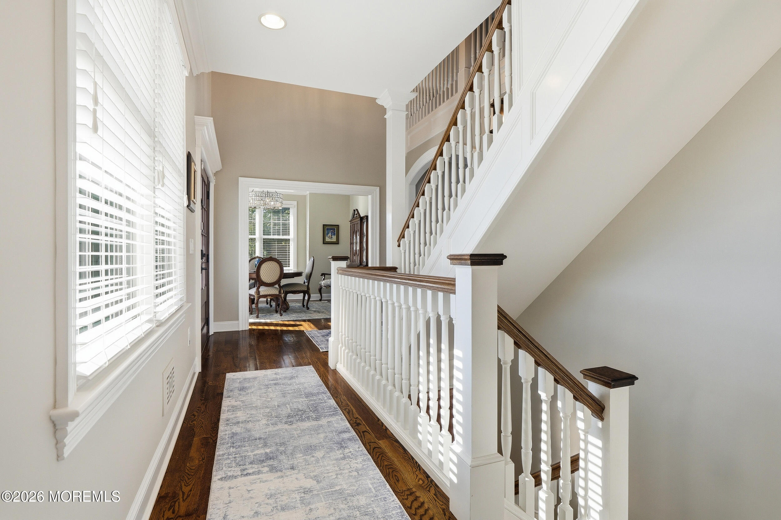 619 Bowne Road Asbury Park, NJ 07712 - Photo 53 of 69 a view of a hallway with wooden floor and stairs