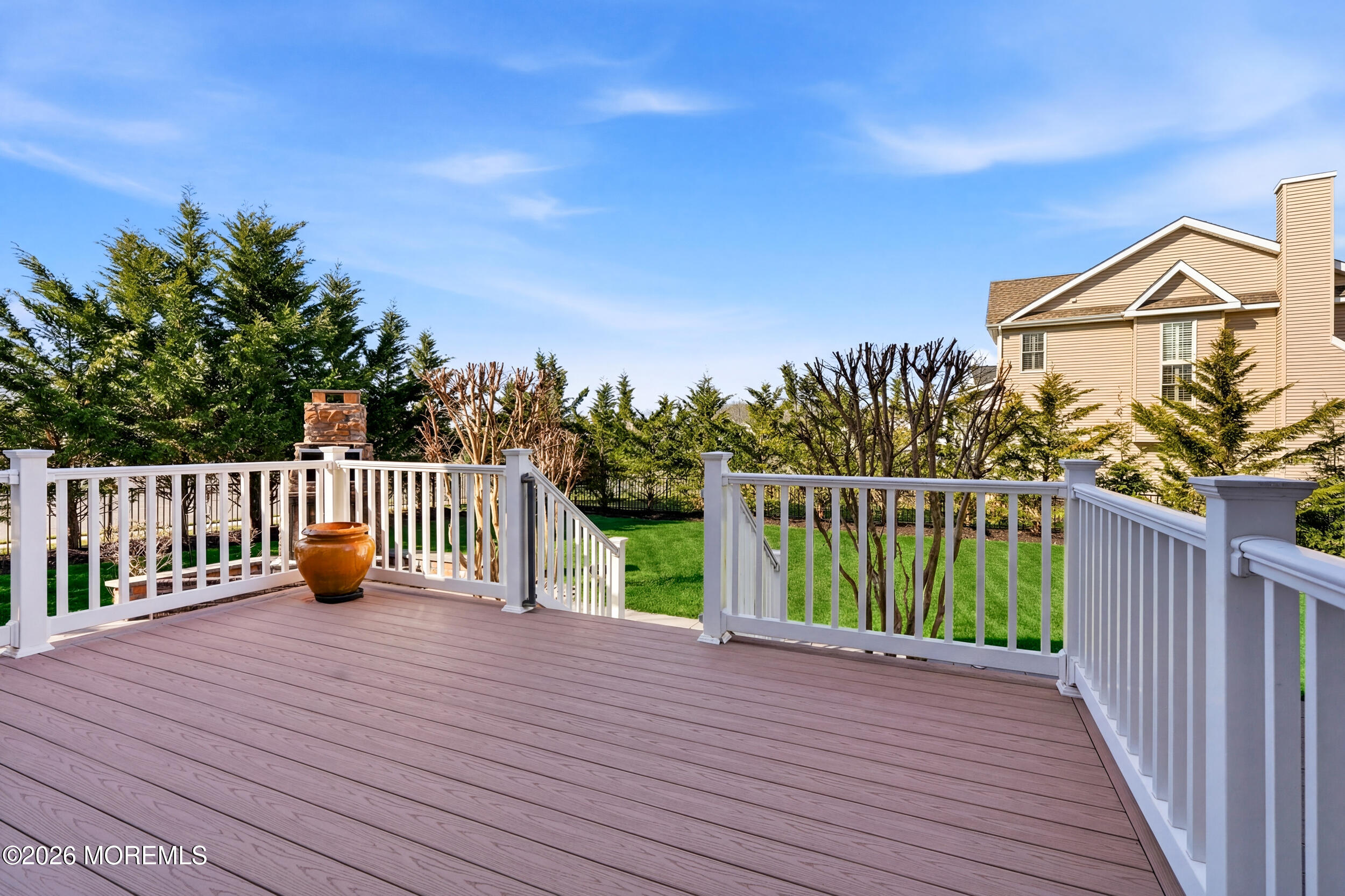 619 Bowne Road Asbury Park, NJ 07712 - Photo 60 of 69 a view of a deck with wooden floor barbeque oven and a fence
