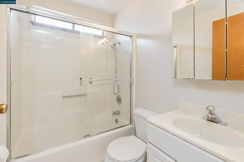 a view of wooden deck with a tree