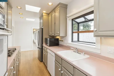 a bathroom with a sink double vanity and a bathtub