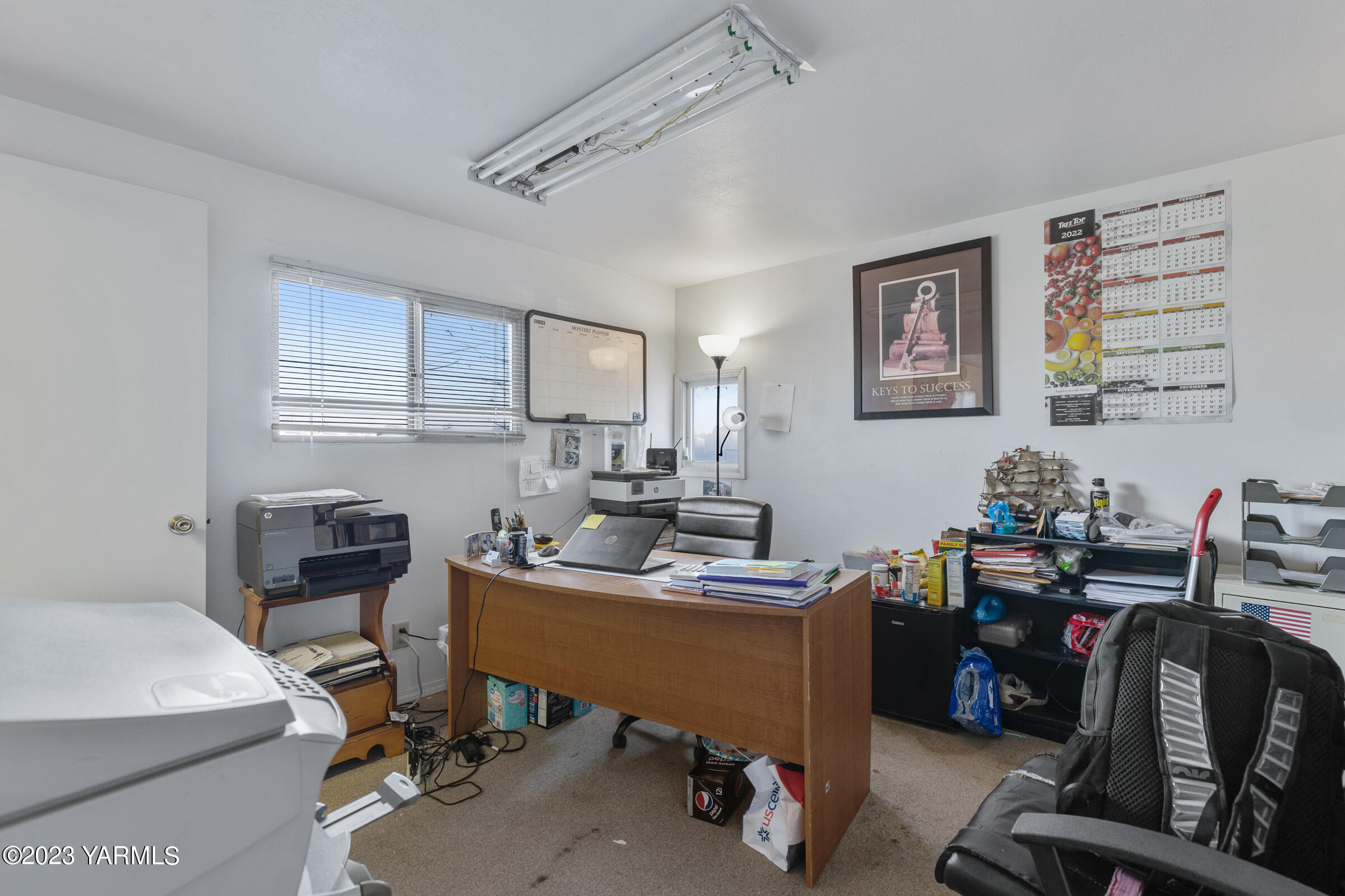 1331 Puterbaugh Road Grandview, WA 98930 - Photo 13 of 18 a view of a workspace with furniture