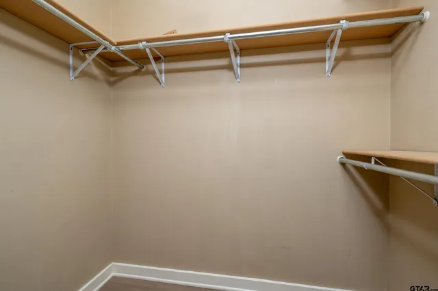 a view of a room with racks on the wall