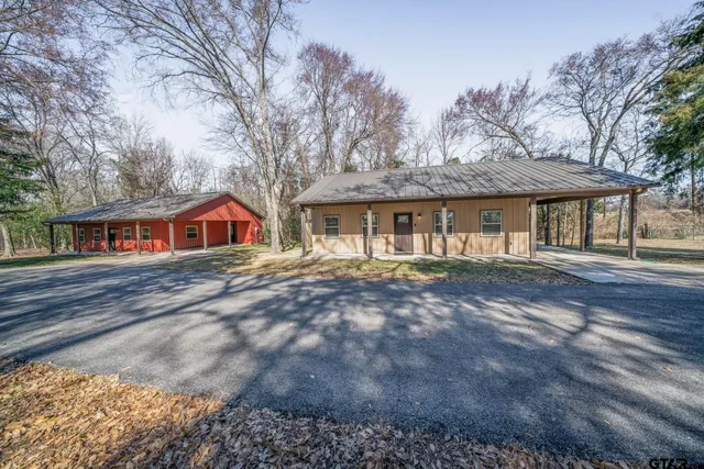 a front view of a house with yard