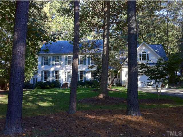 10212 Whitestone Road Raleigh, NC 27615 - Photo 1 of 15 a front view of a house with garden