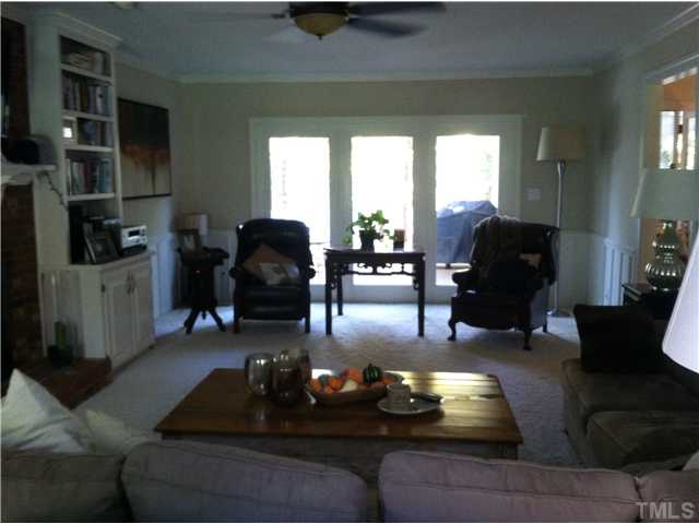 10212 Whitestone Road Raleigh, NC 27615 - Photo 2 of 15 a living room with furniture and a large window