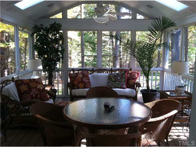 10212 Whitestone Road Raleigh, NC 27615 - Photo 5 of 15 a living room with furniture and a large window