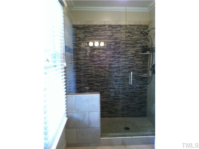 10212 Whitestone Road Raleigh, NC 27615 - Photo 10 of 15 a bathroom with a shower