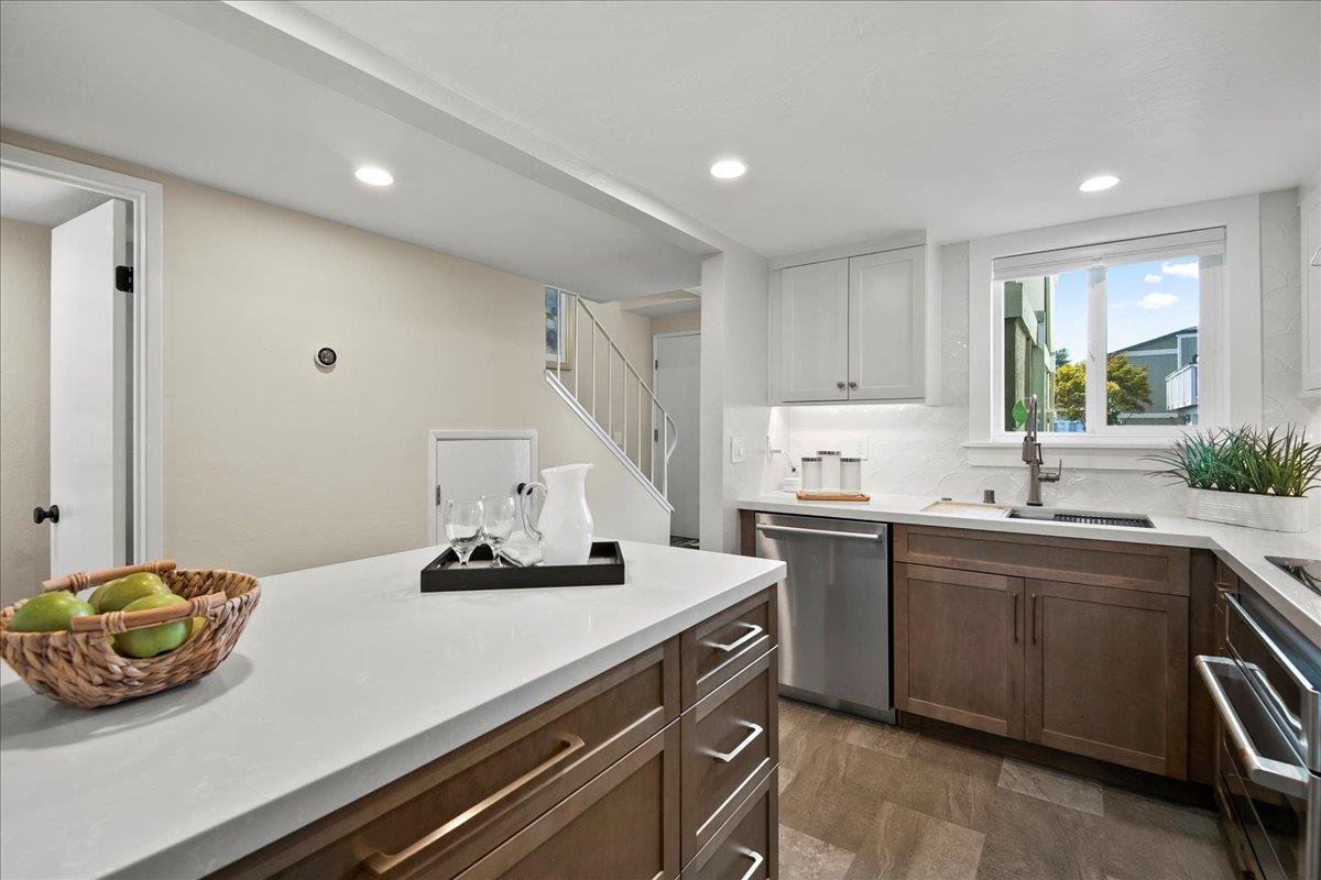 101 Redding Road, Unit C5 Campbell, CA 95008 - Photo 7 of 25 a kitchen with a sink a stove and cabinets