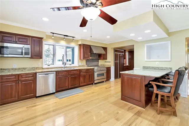 a large kitchen with a cabinets and counter space