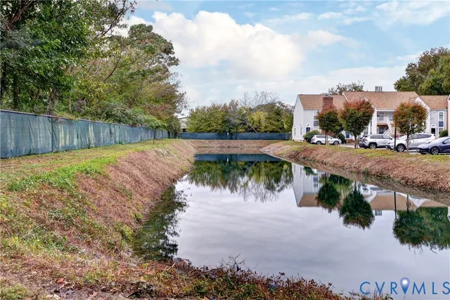 a view of a lake with a big yard