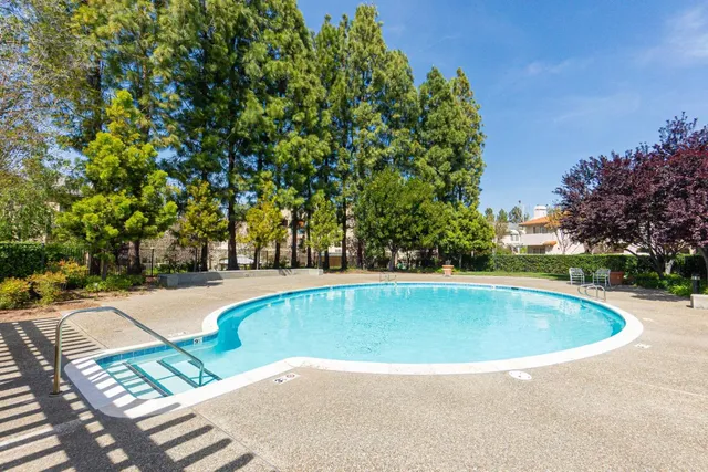 a view of a fountain in the yard