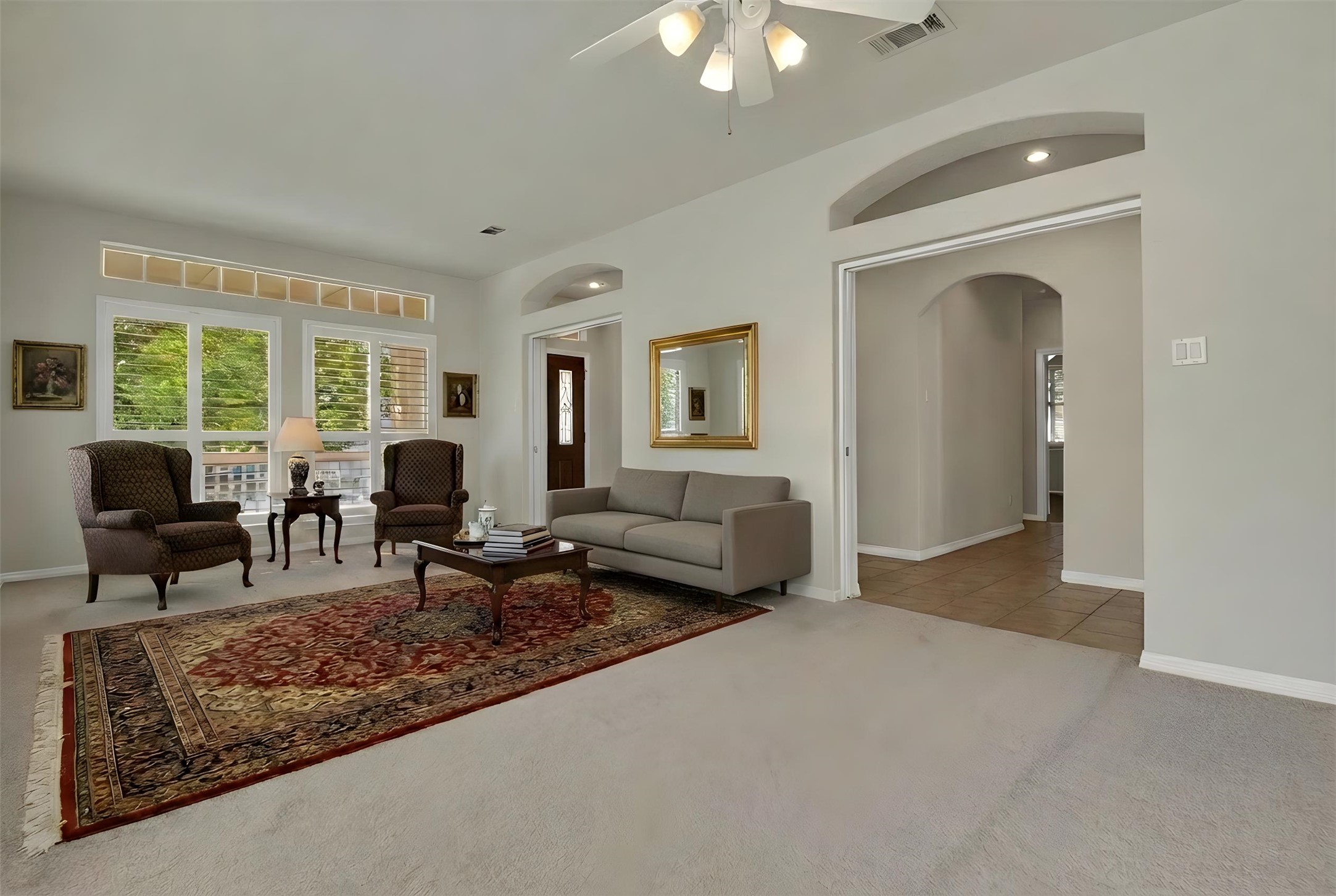 102 Lavaca Lane Georgetown, TX 78628 - Photo 6 of 30 The living room shares space with the formal dining area (virtually staged)