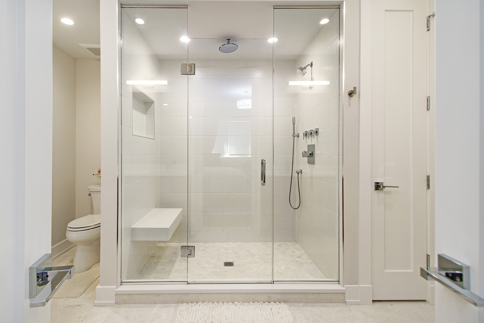 226 South Green Street, Unit 2N Chicago, IL 60607 - Photo 18 of 29 a bathroom with a shower a toilet and sink