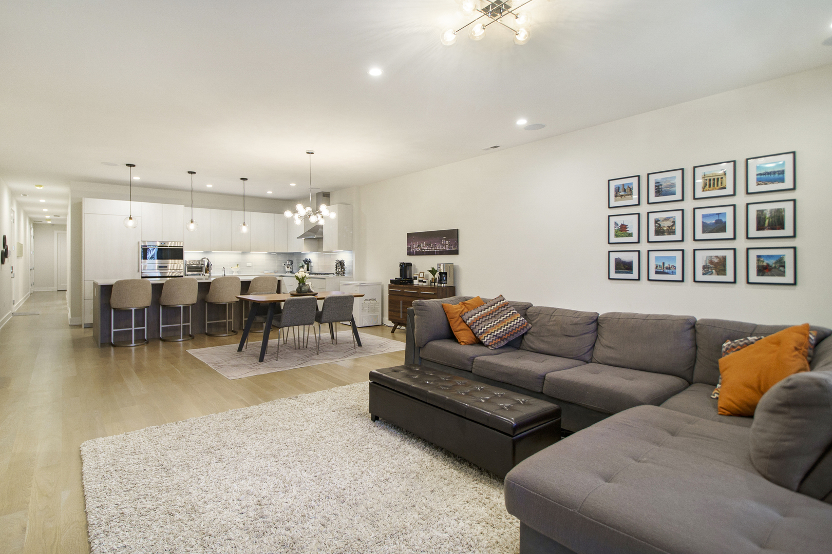 226 South Green Street, Unit 2N Chicago, IL 60607 - Photo 5 of 29 a living room with furniture and kitchen view