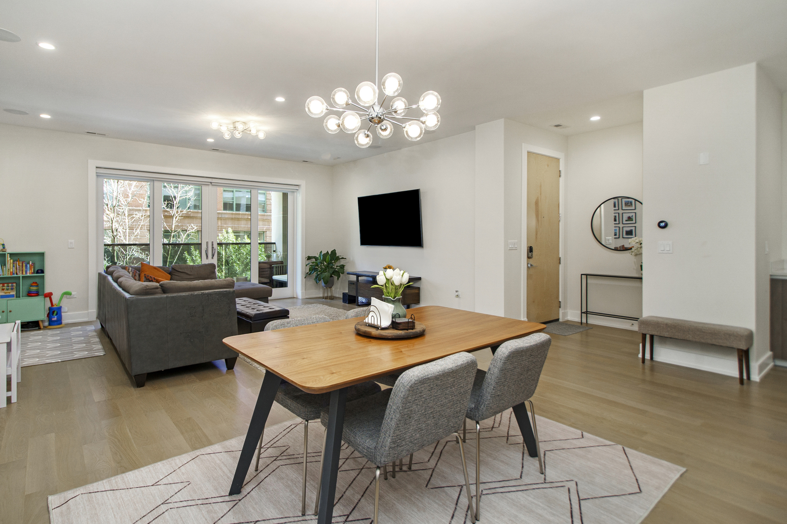 226 South Green Street, Unit 2N Chicago, IL 60607 - Photo 6 of 29 a view of a dining room with furniture and wooden floor