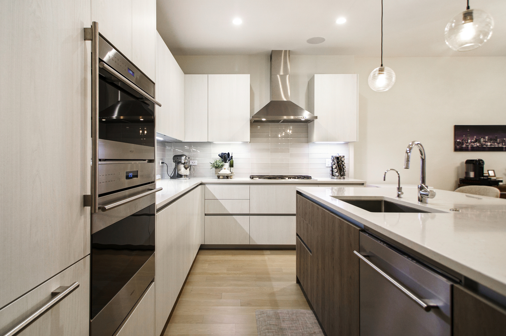 226 South Green Street, Unit 2N Chicago, IL 60607 - Photo 9 of 29 a kitchen with a sink stainless steel appliances and cabinets