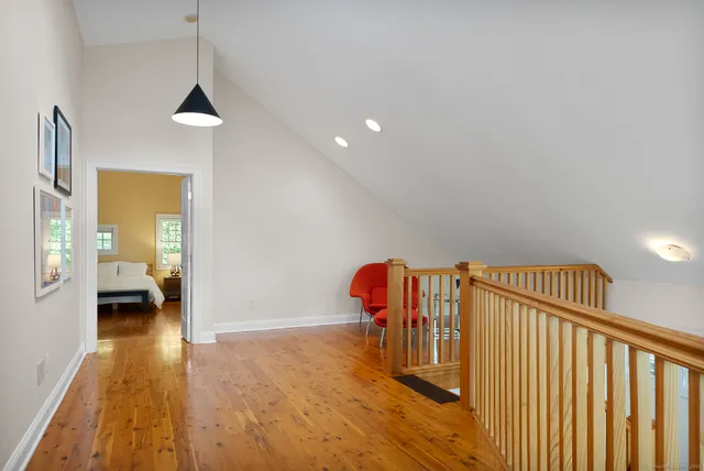 a view of an entryway with wooden floor