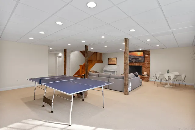 a kitchen with a table and chairs