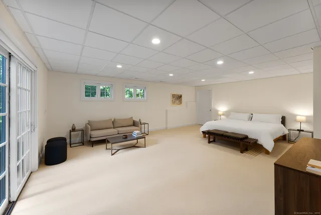 a bedroom with furniture and a bed