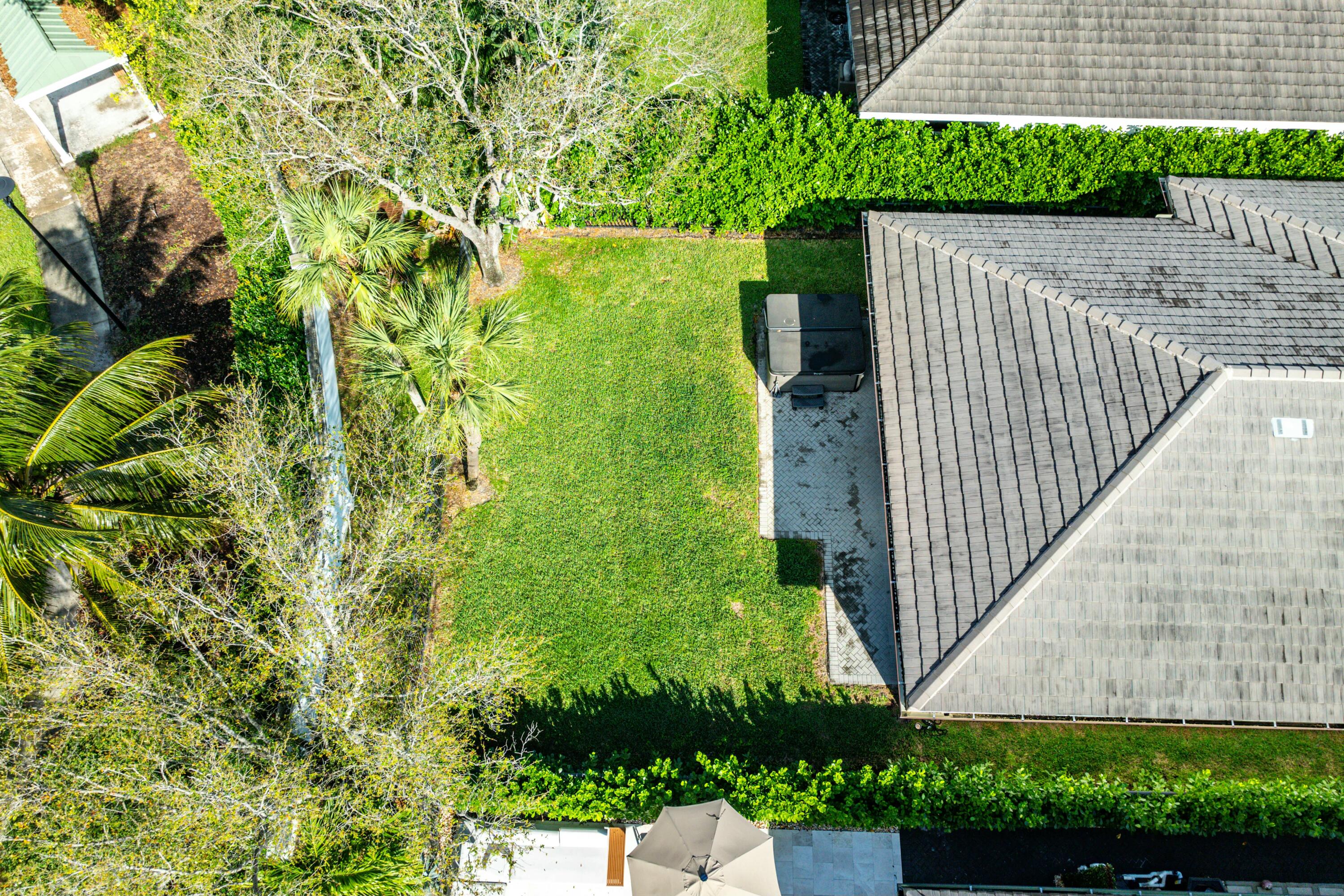 2928 Gin Berry Way West Palm Beach, FL 33401 - Photo 24 of 32 a view of a garden