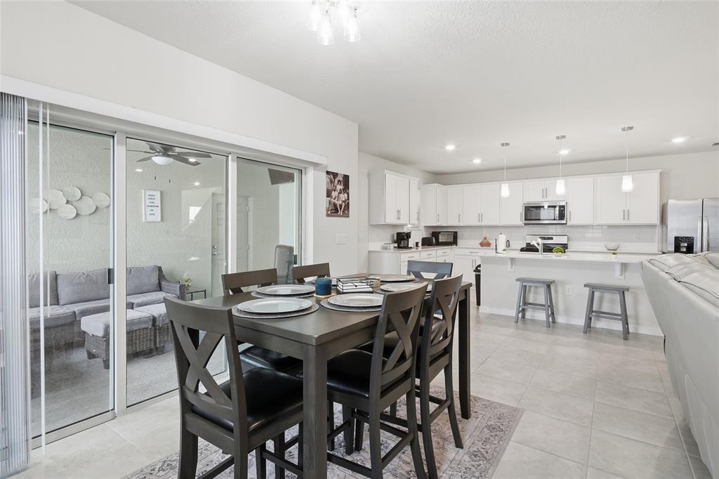 4071 Feather Tree Drive Apopka, FL 32712 - Photo 14 of 52 a view of a dining room kitchen and a counter top space