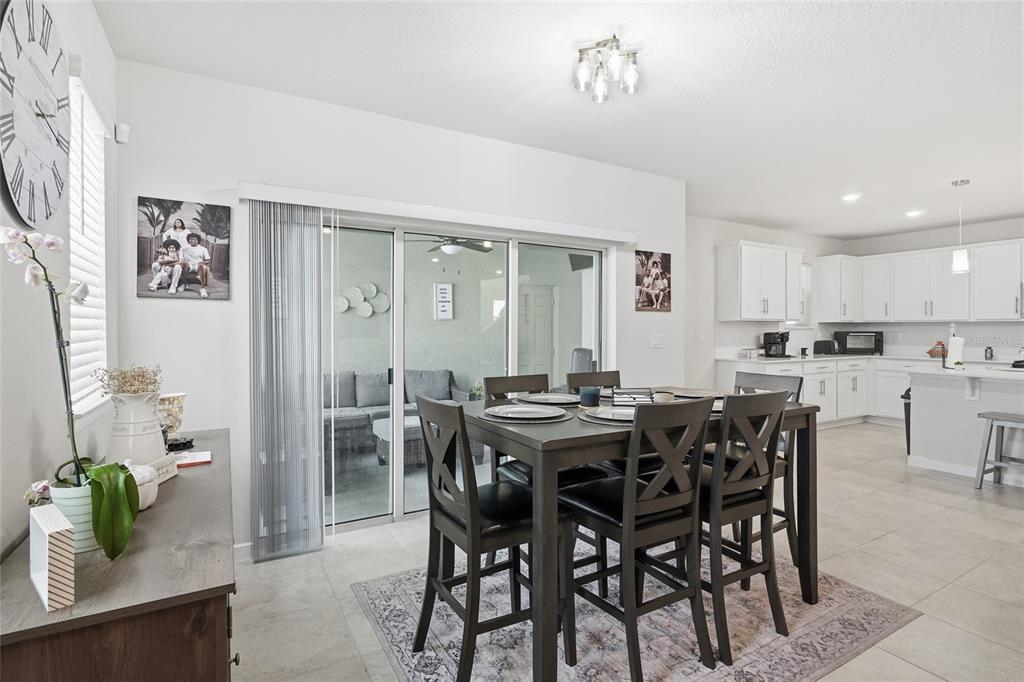 4071 Feather Tree Drive Apopka, FL 32712 - Photo 15 of 52 a view of a dining room with furniture