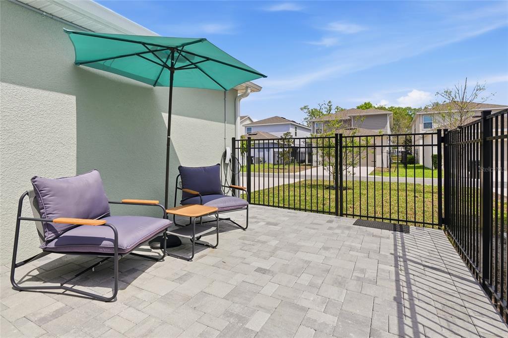4071 Feather Tree Drive Apopka, FL 32712 - Photo 21 of 52 a view of a chairs and table in the back yard