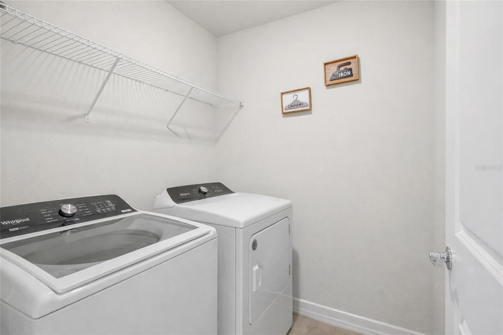 4071 Feather Tree Drive Apopka, FL 32712 - Photo 34 of 52 a utility room with dryer and washer