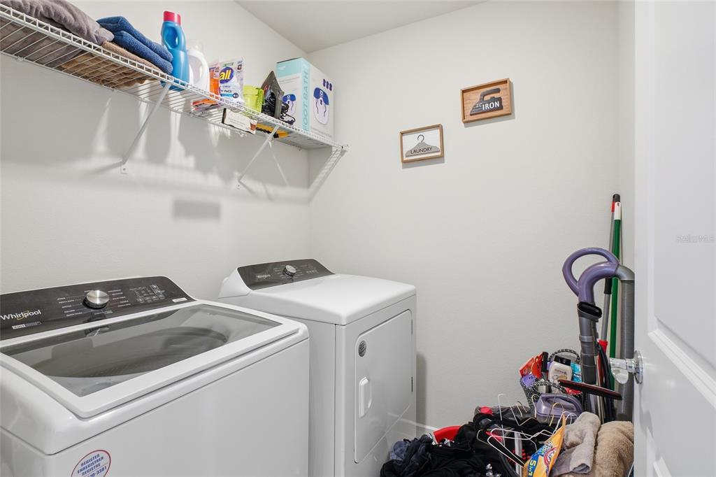 4071 Feather Tree Drive Apopka, FL 32712 - Photo 35 of 52 a utility room with dryer and washer
