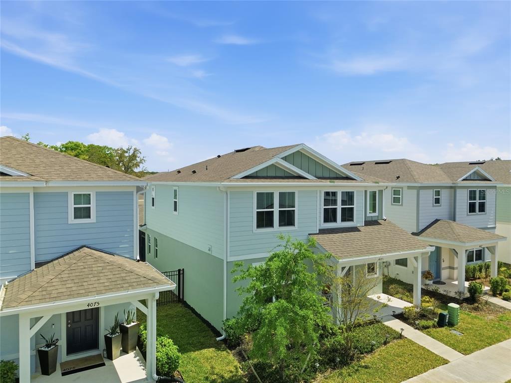 4071 Feather Tree Drive Apopka, FL 32712 - Photo 37 of 52 a front view of a house with a yard