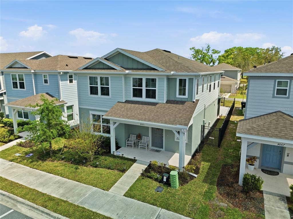 4071 Feather Tree Drive Apopka, FL 32712 - Photo 38 of 52 a front view of a house with a yard