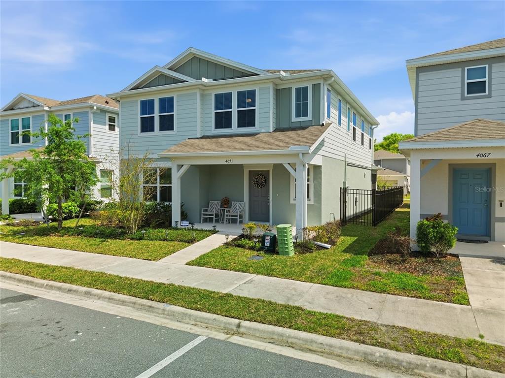 4071 Feather Tree Drive Apopka, FL 32712 - Photo 39 of 52 a front view of a house with a yard